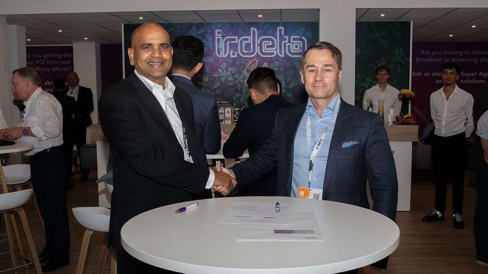 Shaking on it: Vijay Sajja, Founder/CEO of Evergent, and Irdeto CEO Doug Lowther 